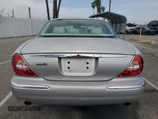 2004 Jaguar XJ Vanden Plas with VIN SAJWA74C04SG25291, listed as a Copart auction lot 56678255 with 176,597 mi miles and Clean Title. Bid and sale history available at DreamBid. Image 6.