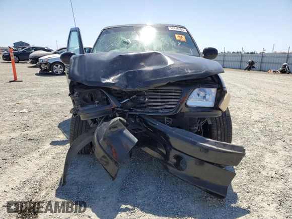 2001 Ford F-150 XLT with VIN 1FTRW07LX1KB47311, listed as a Copart auction lot 58848395 with Not provided miles and Salvage title. Bid and sale history available at DreamBid. Image 5.