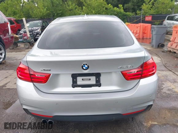 2016 BMW 4 Series 428i xDrive z VIN WBA4C9C57GG137858, wystawiony jako IAAI lot #42755021 z przebiegiem 92 728 mil mil oraz . Historia ofert i sprzedaży dostępna na DreamBid. Obrazek 17.