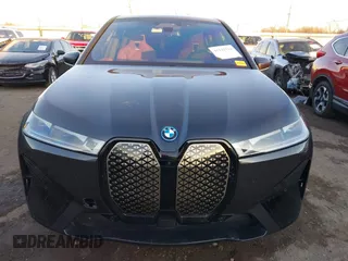 2023 BMW iX M60 with VIN WB533CF05PCM19091, listed as a IAAI auction lot 41223322 with 15,916 mi miles. Bid and sale history available at carsss.com. Image 13.