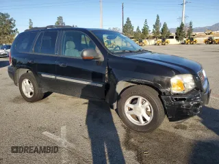 2002 GMC Envoy SLT with VIN 1GKDS13S522485892, listed as a Copart auction lot 49248615 with 152,326 mi miles and Salvage Title. Bid and sale history available at carsss.com. Image 4.