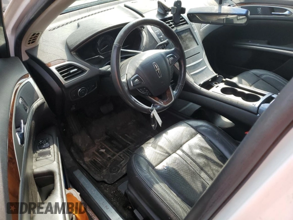 2014 Lincoln MKZ Hybrid с VIN 3LN6L2LU3ER833502, выставлен на аукционе Copart как лот 55996595 с пробегом Не указан миль и Списание • Salvage title. История ставок и продаж доступна на DreamBid. Изображение 8.