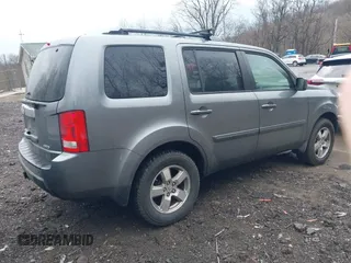 2009 Honda Pilot EX-L with VIN 5FNYF48669B033858, listed as a IAAI auction lot 41918525 with 161,605 mi miles and . Bid and sale history available at carsss.com. Image 4.