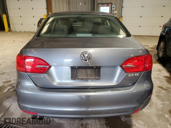2012 Volkswagen Jetta SE with VIN 3VWDX7AJ1CM344402, listed as a Copart auction lot 69927324 with 173,569 mi miles and Salvage title. Bid and sale history available at DreamBid. Image 6.