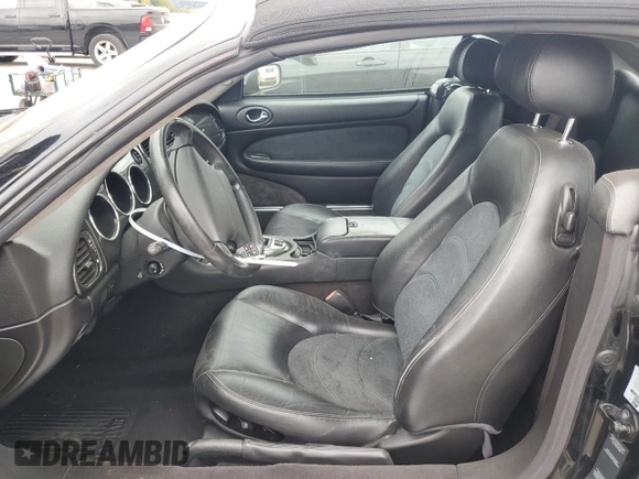2006 Jaguar XK with VIN SAJDA42C462A44968, listed as a Copart auction lot 75758524 with 77,266 mi miles and Salvage Title. Bid and sale history available at carsss.com. Image 7.