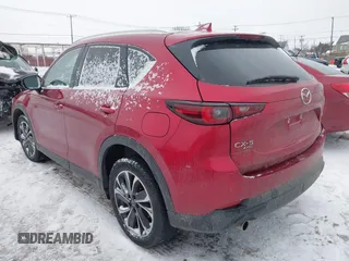 2022 Mazda CX-5 2.5 S Premium Package with VIN JM3KFBDM0N1628116, listed as a IAAI auction lot 41455990 with 29,911 mi miles. Bid and sale history available at carsss.com. Image 3.