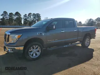 2016 Nissan Titan SL z VIN 1N6BA1F22GN503205, wystawiony jako Copart lot #47024925 z przebiegiem 90 936 mil mil oraz Czysty tytuł • Clean title. Historia ofert i sprzedaży dostępna na DreamBid. Obrazek 1.