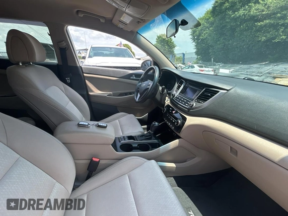 2017 Hyundai Tucson Sport with VIN KM8J3CA29HU351485, listed as a Copart auction lot 56537955 with 121,371 mi miles and Clean Title. Bid and sale history available at DreamBid. Image 5.