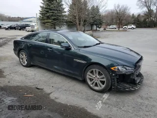 2016 Jaguar XJ Portfolio z VIN SAJWJ2GD0G8V92850, wystawiony jako Copart lot #47844065 z przebiegiem 99 652 mil mil oraz Szkoda całkowita • Salvage title. Historia ofert i sprzedaży dostępna na DreamBid. Obrazek 4.
