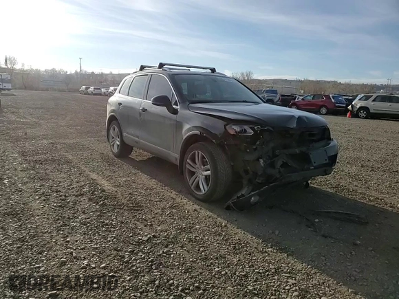 2011 Volkswagen Touareg Exec with VIN WVGFK9BP6BD006430, listed as a Copart auction lot 84288014 with 186,189 mi miles and Salvage Title. Bid and sale history available at DreamBid. Image 12.