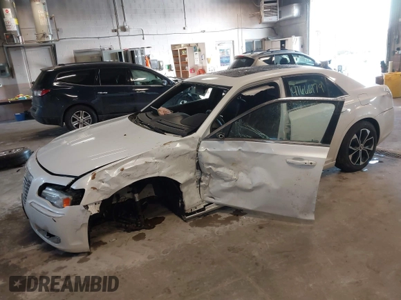 2014 Chrysler 300 with VIN 2C3CCAAGXEH217715, listed as a IAAI auction lot 41666179 with 145,744 mi miles and . Bid and sale history available at DreamBid. Image 2.