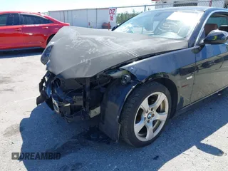 2010 BMW 3 Series 328i with VIN WBAWV1C58AP124385, listed as a IAAI auction lot 41761958 with 197,944 mi miles. Bid and sale history available at carsss.com. Image 6.
