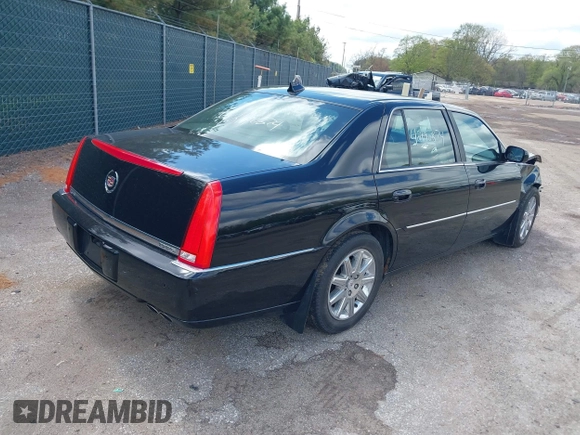 2009 Cadillac DTS 1SC z VIN 1G6KD57Y29U141800, wystawiony jako IAAI lot #42190874 z przebiegiem 115 043 mil mil oraz . Historia ofert i sprzedaży dostępna na DreamBid. Obrazek 4.