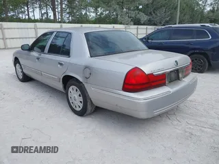 2004 Mercury Grand Marquis GS z VIN 2MEFM74W04X669087, wystawiony jako IAAI lot #42090394 z przebiegiem 172 008 mil mil oraz . Historia ofert i sprzedaży dostępna na DreamBid. Obrazek 3.