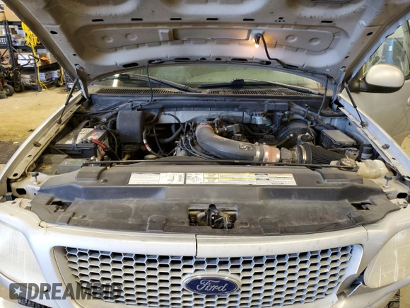1999 Ford F-150 with VIN 1FTRX18W2XKB01444, listed as a Copart auction lot 52717195 with 210,581 mi miles and Clean title. Bid and sale history available at DreamBid. Image 11.