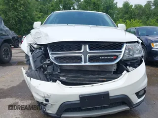 2019 Dodge Journey SE with VIN 3C4PDCBB6KT833777, listed as a IAAI auction lot 42411738 with 32,133 mi miles and . Bid and sale history available at DreamBid. Image 6.