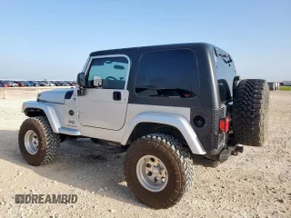 2005 Jeep Wrangler X с VIN 1J4FA39S45P353119, выставлен на аукционе Copart как лот 64206825 с пробегом 134 298 миль миль и Списание • Salvage title. История ставок и продаж доступна на DreamBid. Изображение 2.