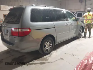 2007 Honda Odyssey EX-L with VIN 5FNRL38697B012944, listed as a IAAI auction lot 42144250 with 234,016 mi miles and . Bid and sale history available at DreamBid. Image 4.