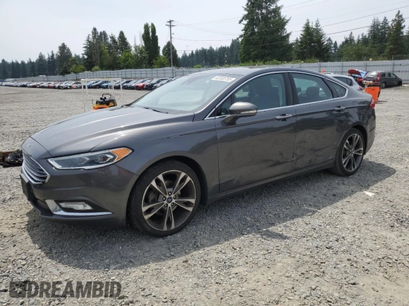 2017 Ford Fusion Titanium z VIN 3FA6P0K95HR139060, wystawiony jako Copart lot #62200755 z przebiegiem 106 133 mil mil oraz Szkoda całkowita • Salvage title. Historia ofert i sprzedaży dostępna na DreamBid. Obrazek 1.