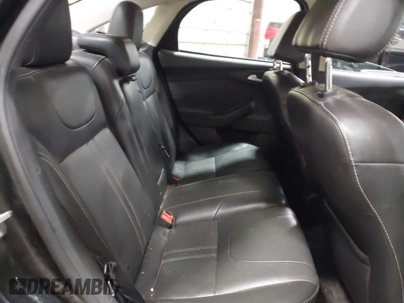 2014 Ford Focus Titanium with VIN 1FADP3J22EL199563, listed as a IAAI auction lot 41450106 with 129,271 mi miles. Bid and sale history available at carsss.com. Image 8.