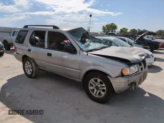 2004 Isuzu Rodeo S with VIN 4S2DM58W144316571, listed as a Copart auction lot 72086554 with Not Provided miles and Salvage Title. Bid and sale history available at DreamBid. Image 4.