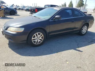 2001 Honda Accord EX z VIN 1HGCG22551A022831, wystawiony jako Copart lot #52011585 z przebiegiem 248 025 mil mil oraz Szkoda całkowita • Salvage title. Historia ofert i sprzedaży dostępna na DreamBid. Obrazek 1.
