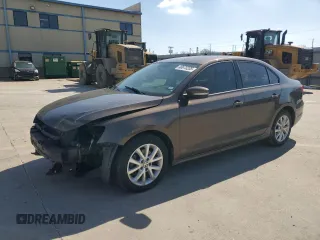 2012 Volkswagen Jetta Sedan SE w/Convenience with VIN 3VWDX7AJ1CM454317, listed as a Copart auction lot 48673205 with 136,971 mi miles and Salvage Title. Bid and sale history available at carsss.com. Image 1.