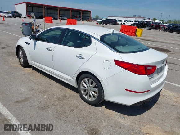 2015 Kia Optima LX with VIN 5XXGM4A76FG443962, listed as a IAAI auction lot 42069701 with 101,516 mi miles. Bid and sale history available at carsss.com. Image 3.