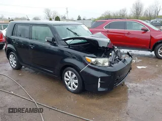 2013 Scion xB with VIN JTLZE4FE6DJ035732, listed as a IAAI auction lot 41965357 with 145,456 mi miles. Bid and sale history available at carsss.com. Image 1.
