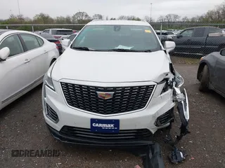 2021 Cadillac XT5 FWD Luxury with VIN 1GYKNAR47MZ121920, listed as a IAAI auction lot 41868087 with 38,315 mi miles. Bid and sale history available at carsss.com. Image 12.
