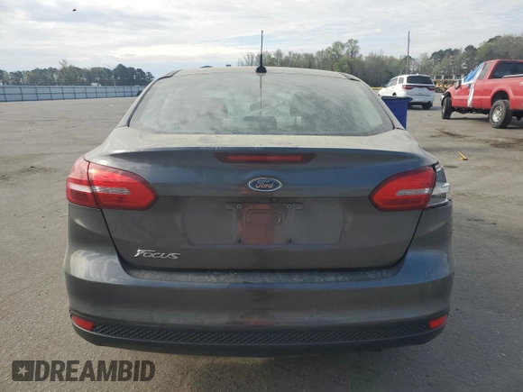 2017 Ford Focus S z VIN 1FADP3E24HL282698, wystawiony jako Copart lot #51001325 z przebiegiem 112 325 mil mil oraz Szkoda całkowita • Salvage title. Historia ofert i sprzedaży dostępna na DreamBid. Obrazek 6.