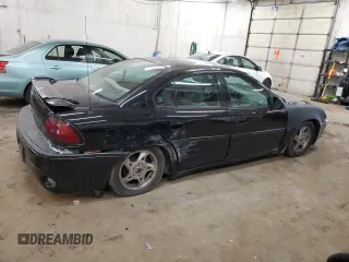 2003 Pontiac Grand Am GT with VIN 1G2NW52EX3M579719, listed as a Copart auction lot 49891365 with 153,838 mi miles and Salvage Title. Bid and sale history available at carsss.com. Image 3.