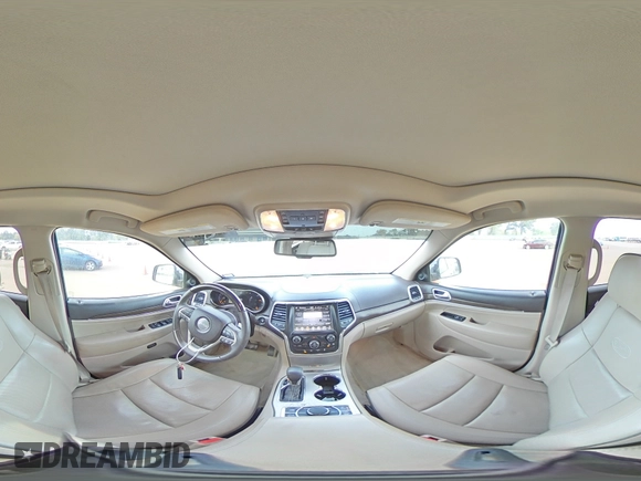 2016 Jeep Grand Cherokee Overland with VIN 1C4RJFCT2GC320247, listed as a Copart auction lot 50832195 with 104,300 mi miles and Salvage title. Bid and sale history available at DreamBid. Image 14.