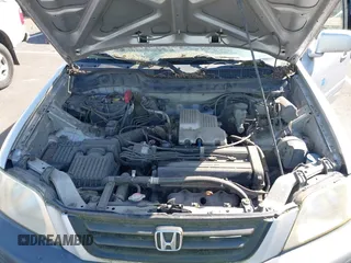 2001 Honda CR-V EX with VIN JHLRD18671C013132, listed as a IAAI auction lot 42057704 with 261,635 mi miles. Bid and sale history available at carsss.com. Image 9.
