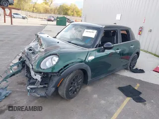 2016 MINI Cooper Hardtop 4 Door S with VIN WMWXU3C58G2D28227, listed as a IAAI auction lot 38046281 with 56,694 mi miles. Bid and sale history available at carsss.com. Image 18.