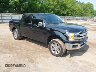 2018 Ford F-150 XL with VIN 1FTEW1EG0JFA76431, listed as a IAAI auction lot 42470632 with 148,053 mi miles and . Bid and sale history available at DreamBid. Image 1.
