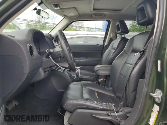 2009 Jeep Patriot Limited with VIN 1J4FT48B79D120490, listed as a Copart auction lot 55071885 with 173,311 mi miles and Salvage title. Bid and sale history available at DreamBid. Image 7.