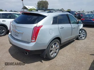2012 Cadillac SRX Performance Collection with VIN 3GYFNBE37CS615517, listed as a IAAI auction lot 42541029 with 54,159 mi miles and . Bid and sale history available at DreamBid. Image 4.