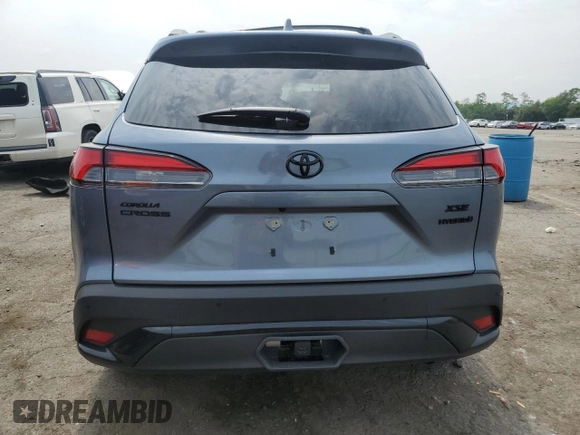 2024 Toyota Corolla Cross Hybrid S with VIN 7MUFBABG0RV053138, listed as a Copart auction lot 59515915 with 7,065 mi miles and Salvage title. Bid and sale history available at DreamBid. Image 6.