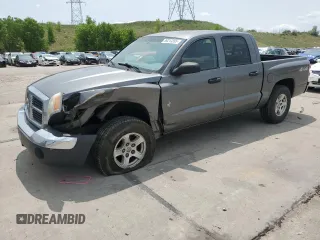 2005 Dodge Dakota SLT z VIN 1D7HW48K15S353766, wystawiony jako Copart lot #59213395 z przebiegiem 182 659 mil mil oraz Szkoda całkowita • Salvage title. Historia ofert i sprzedaży dostępna na DreamBid. Obrazek 1.