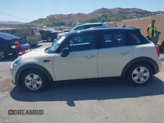 2016 MINI Hardtop 4 Door with VIN WMWXU1C56G2D10605, listed as a IAAI auction lot 42411431 with 35,367 mi miles and . Bid and sale history available at DreamBid. Image 13.