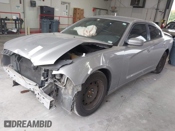 2013 Dodge Charger SE with VIN 2C3CDXBG7DH601545, listed as a IAAI auction lot 40332328 with 162,992 mi miles. Bid and sale history available at carsss.com. Image 2.