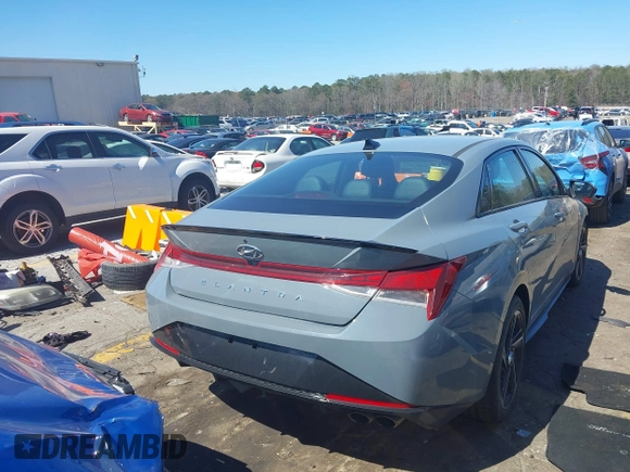 2023 Hyundai Elantra N Line z VIN KMHLR4AFXPU375874, wystawiony jako IAAI lot #41813523 z przebiegiem 59 060 mil mil oraz . Historia ofert i sprzedaży dostępna na DreamBid. Obrazek 4.