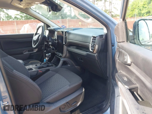 2024 Ford Ranger XLT z VIN 1FTER4GH0RLE15572, wystawiony jako IAAI lot #42138297 z przebiegiem 6 624 mil mil oraz . Historia ofert i sprzedaży dostępna na DreamBid. Obrazek 5.