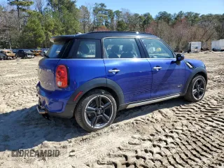 2016 MINI Countryman S with VIN WMWZC5C56GWP49473, listed as a Copart auction lot 50752355 with 118,060 mi miles and Salvage Title. Bid and sale history available at DreamBid. Image 3.