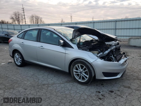 2015 Ford Focus SE with VIN 1FADP3F2XFL306322, listed as a Copart auction lot 41367765 with 58,901 mi miles and Salvage Title. Bid and sale history available at DreamBid. Image 4.