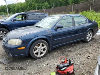 2003 Nissan Maxima SE z VIN JN1DA31D43T502355, wystawiony jako Copart lot #57233745 z przebiegiem 161 005 mil mil oraz Szkoda całkowita • Salvage title. Historia ofert i sprzedaży dostępna na DreamBid. Obrazek 1.
