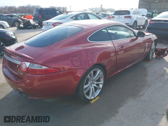 2008 Jaguar XK with VIN SAJWA43C089B22700, listed as a IAAI auction lot 41585734 with 67,946 mi miles. Bid and sale history available at carsss.com. Image 4.