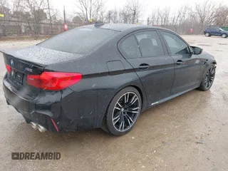 2020 BMW M5 Competition z VIN WBSJF0C00LCD37331, wystawiony jako IAAI lot #41738410 z przebiegiem 49 788 mil mil oraz . Historia ofert i sprzedaży dostępna na DreamBid. Obrazek 4.