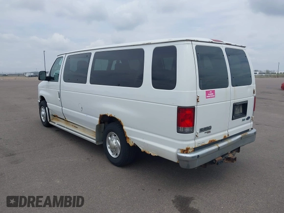 2010 Ford Econoline Passenger XL with VIN 1FBSS3BL1ADA74036, listed as a IAAI auction lot 42177046 with 205,186 mi miles. Bid and sale history available at carsss.com. Image 3.